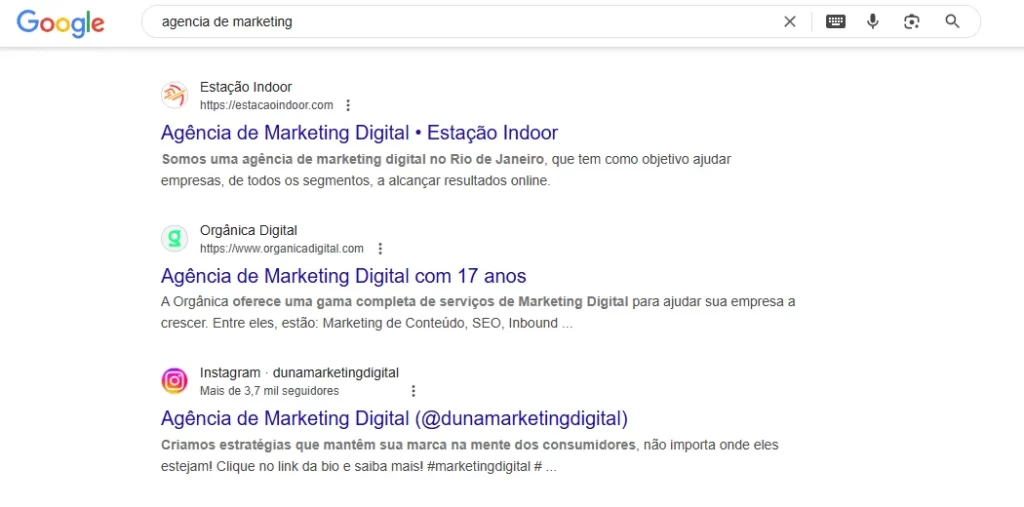 Resultados de busca no Google para agencia de marketing digital com links para Estação Indoor, Orgânica Digital e Instagram